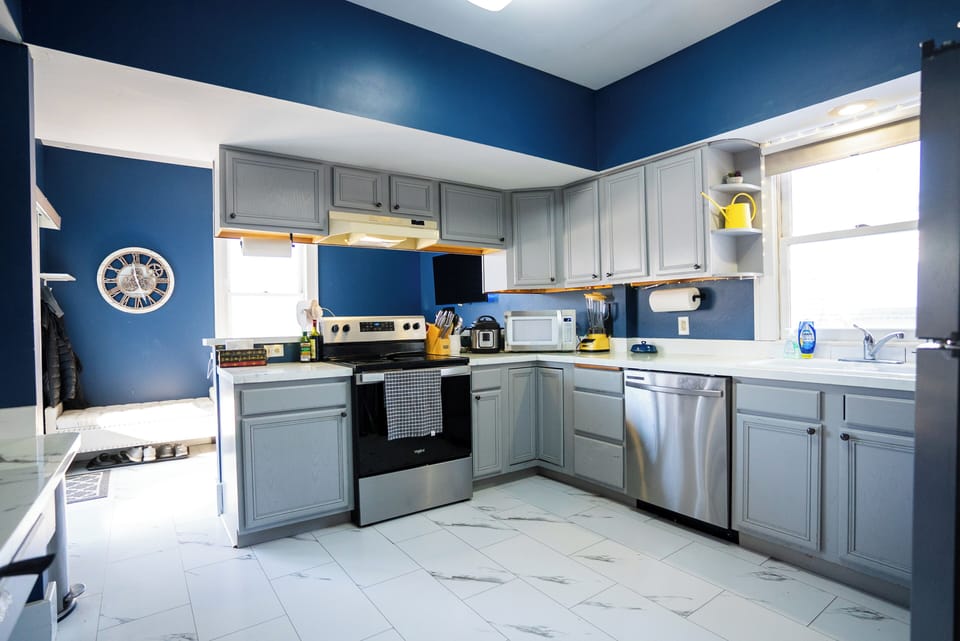 Full kitchen with stainless appliance and cooking basics, Keurig single-serve