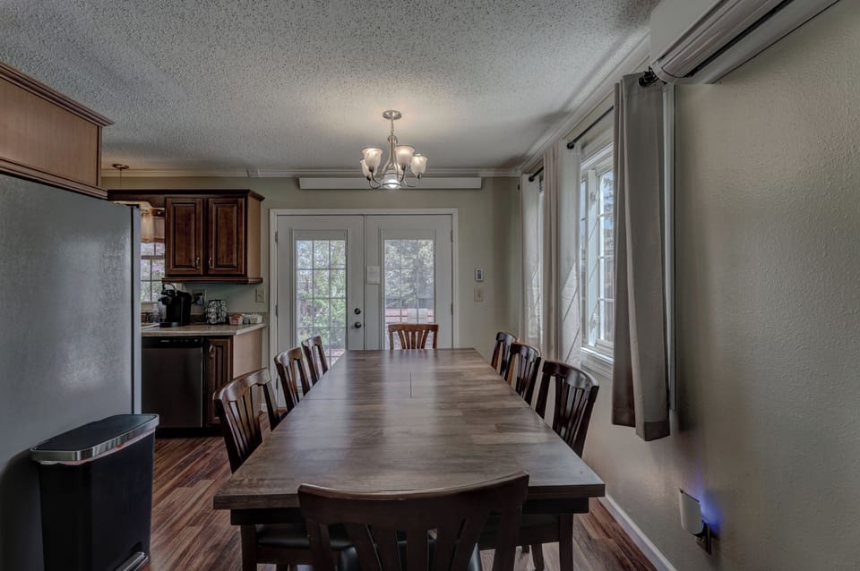 Dining area with dining table with seating for 8-10