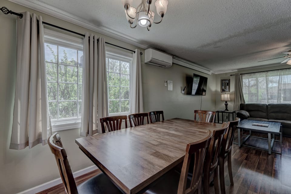 Dining area with dining table with seating for 8-10
