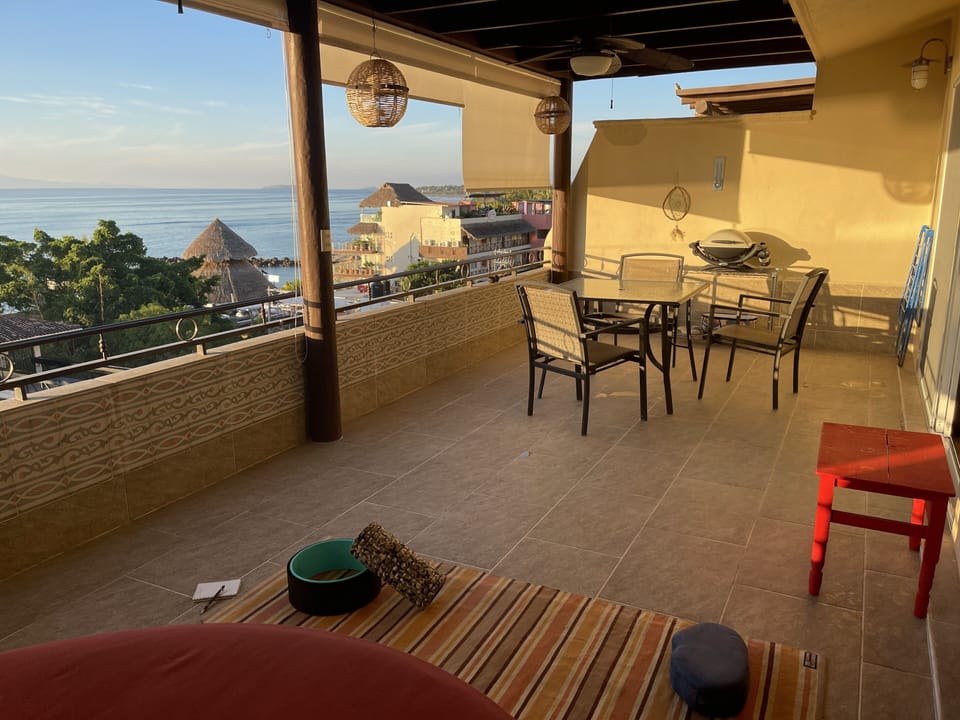 Spacious patio great for morning workouts and evening dinners. Shades for heat!