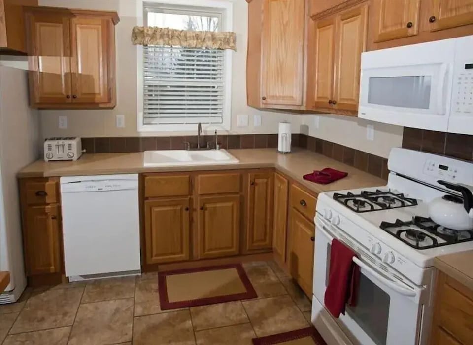 full size kitchen w/laundry area and 2-refridgerators