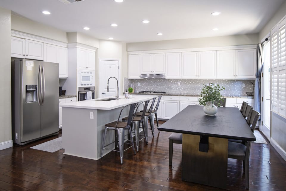 Full Kitchen with table seating for 8 and 4 at the bar