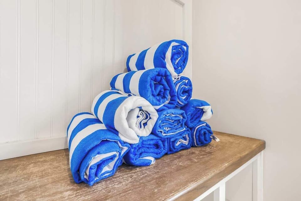 Don't worry about buying beach towels. We have you covered. 
