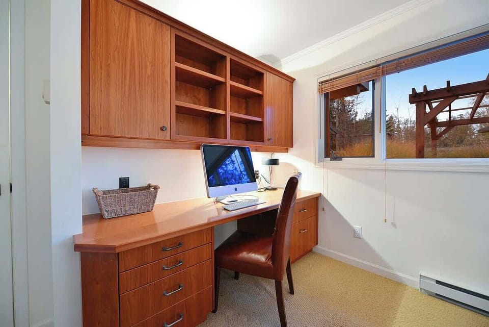 Third bedroom with queen bed and work space.