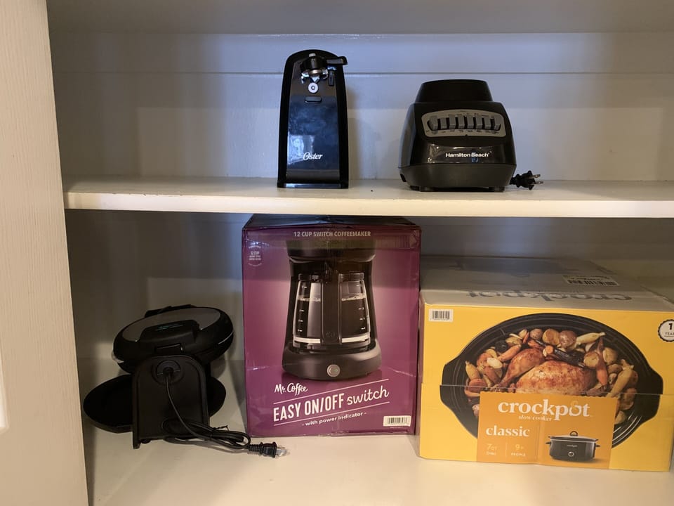 Electrical appliances plus pots, pans, mixing bowls, cookie sheets, etc..