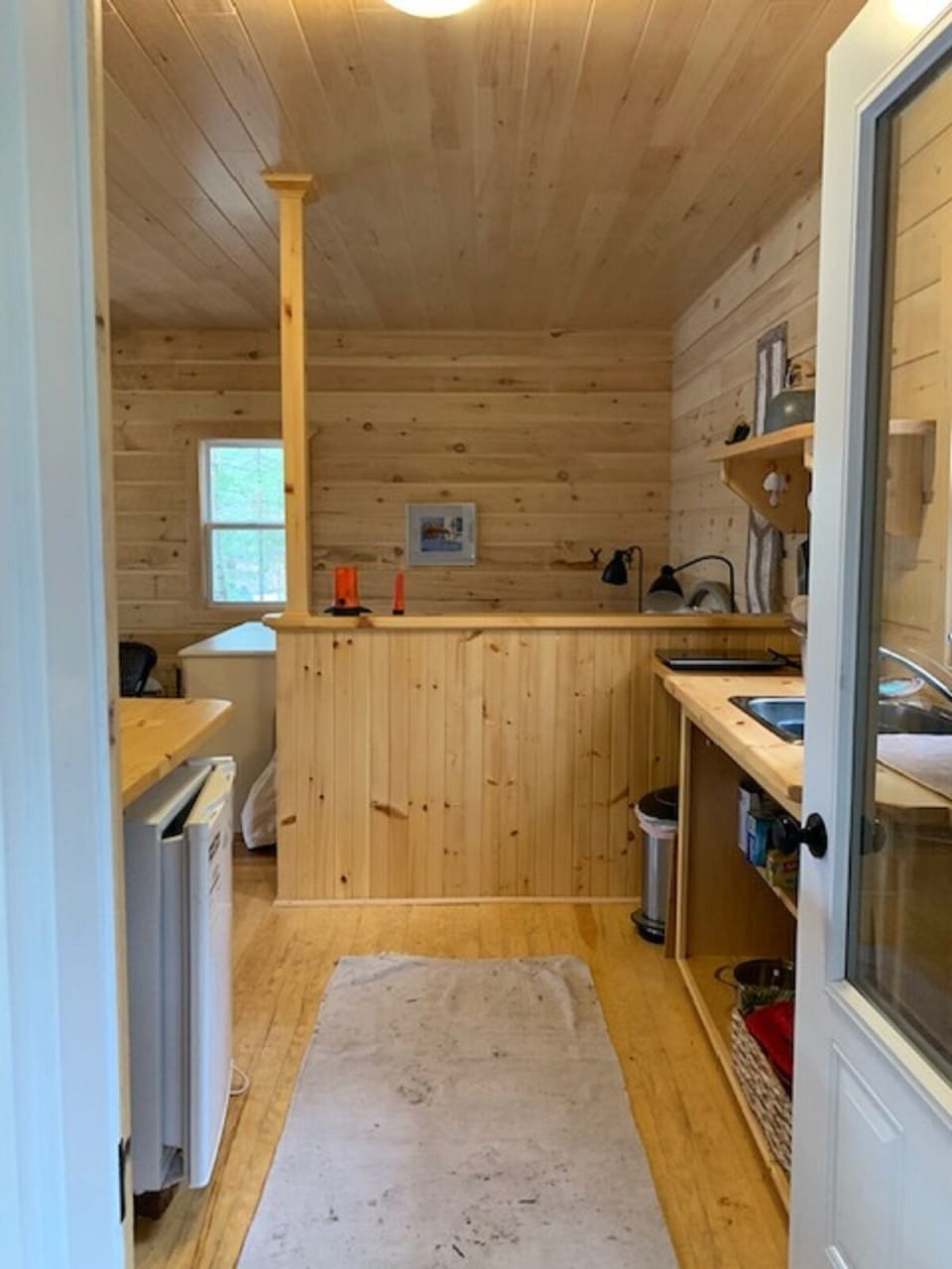 Kitchen area in main cabin (bed beyond knee wall)