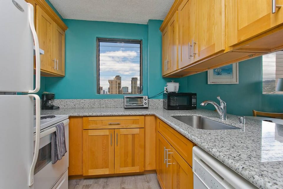 Full kitchen with cooking utensils