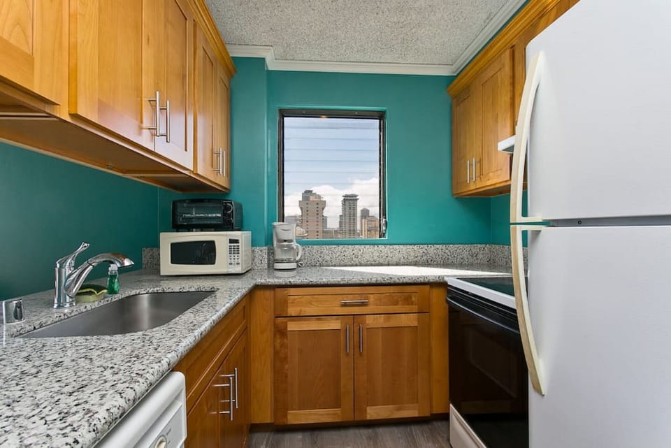 Full kitchen with cooking utensils