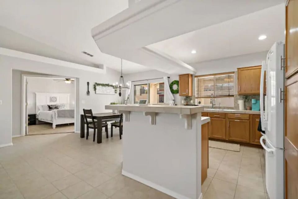 Open concept living area - ROKU TV - open to kitchen and dining area. Cozy comfortable couch and layout