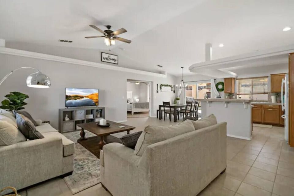 Open concept living area - ROKU TV - open to kitchen and dining area. Cozy comfortable couch and layout