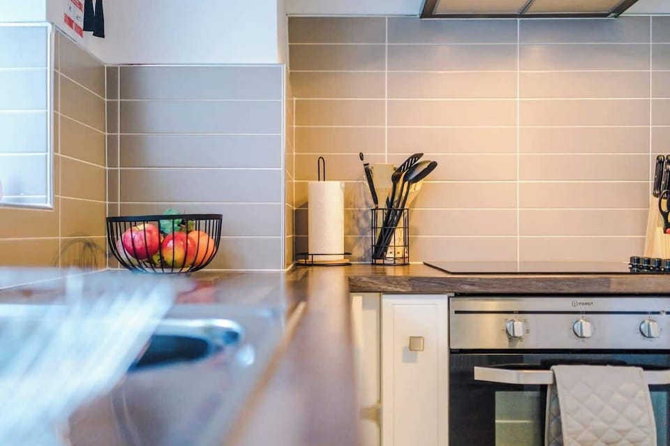 The fully equipped kitchen is perfect for cooking an array of meals during your stay.