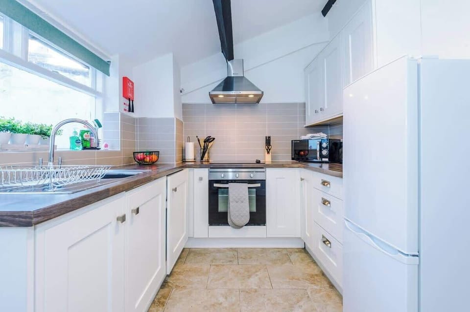 The fully equipped kitchen is perfect for cooking an array of meals during your stay.