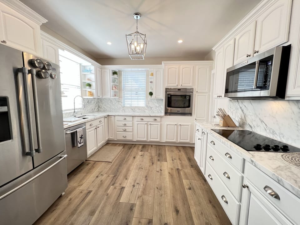 Kitchen with Keurig latte coffee machine.