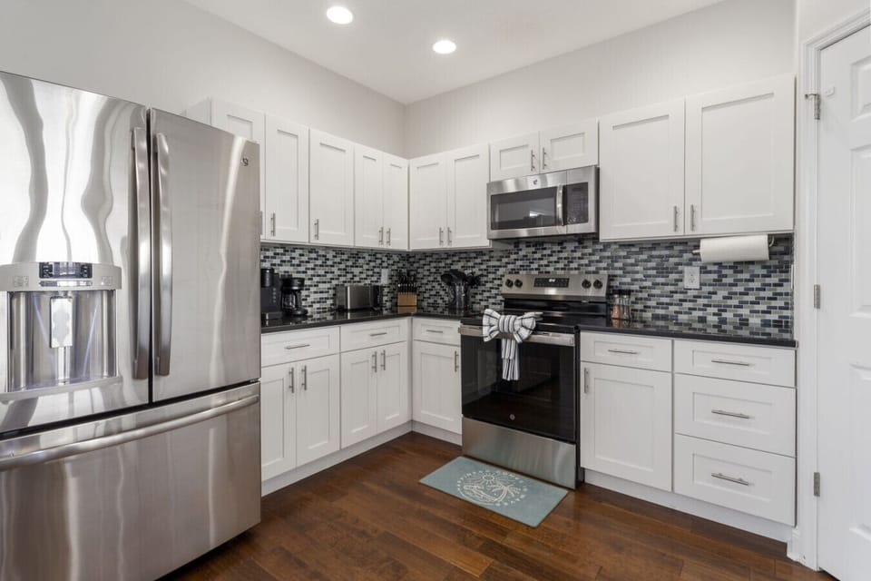 Double door fridge and lots of cabinetry ensure you have all the storage space you need