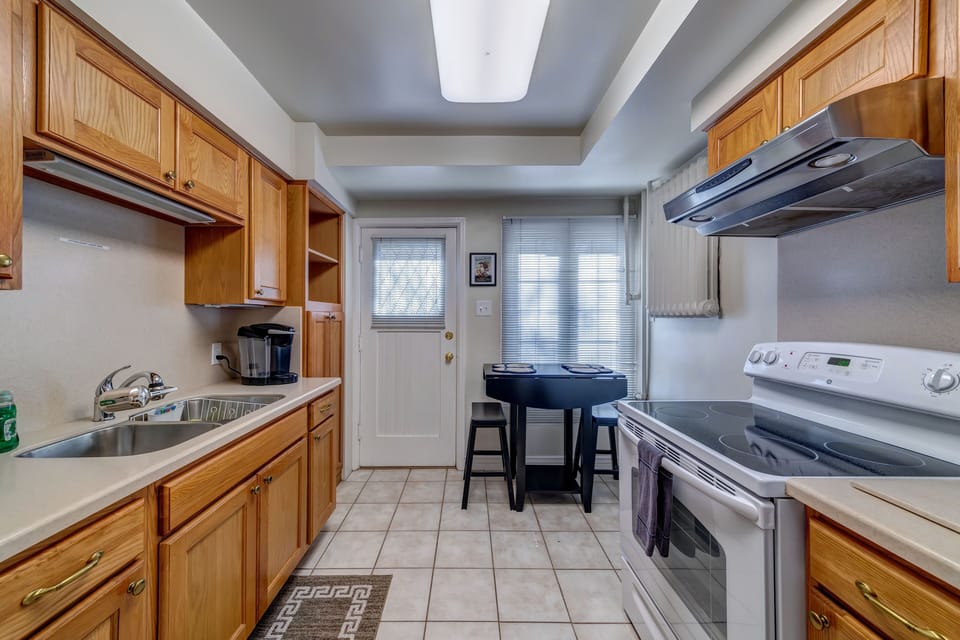 Keurig Coffee Maker with pods and snacks provided.
