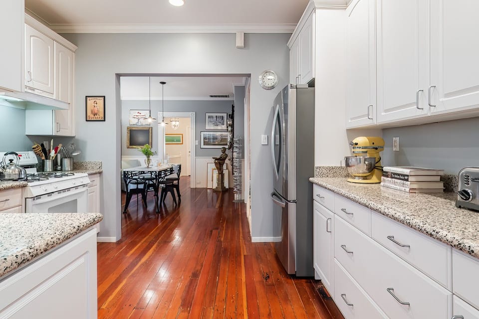 The kitchen leads to another dining/relaxing area.  