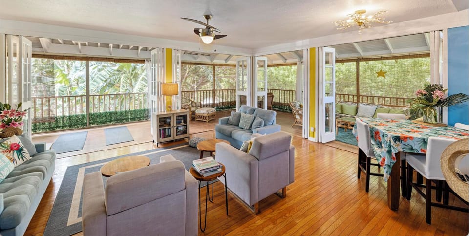 there's now a smart TV in the living room above the lamp mounted on the wall