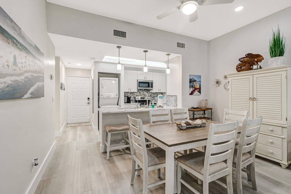 Gather round for a meal or a game of cards at the dining table with seating for 6 in the main living space.