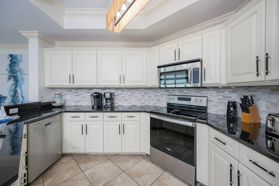 Create delicious meals together in this bright kitchen, enjoying the style and functionality of the space