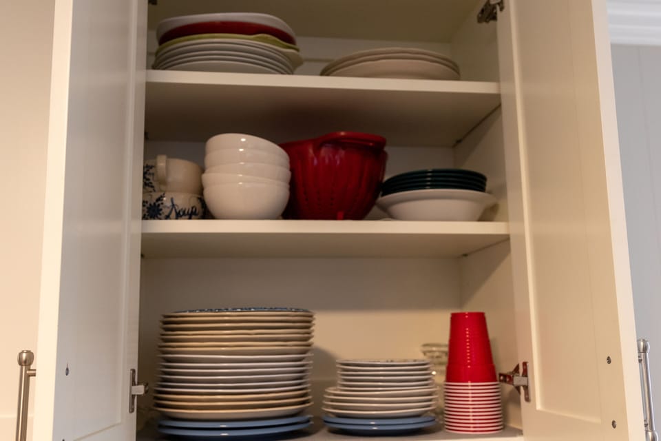 Full place settings plus all utensils are in the fully stocked kitchen cabinets.