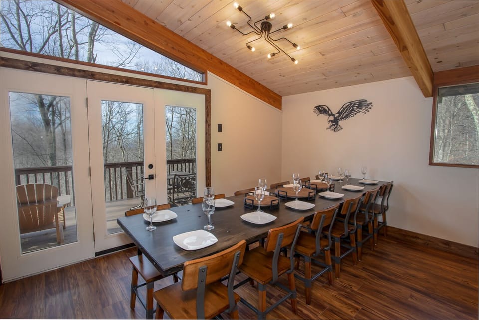 Huge Custom-Crafted Banquet-Style Dining Table seats 12 guests! Additional Seating for 5 in the Bar Area making a total of 17 seats!