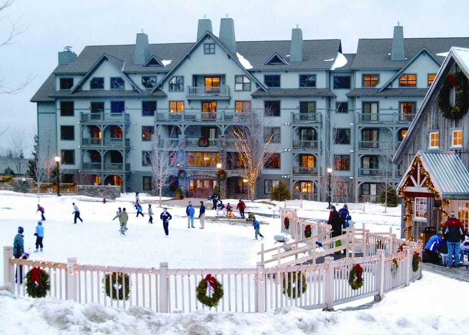 Skating pond, Mill House (on right) and Rising Bear Lodge