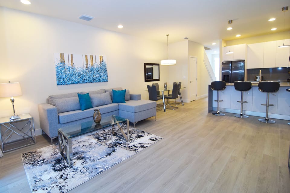 Beautiful open-plan living space with living area, Smart TV, L-shaped sofa
