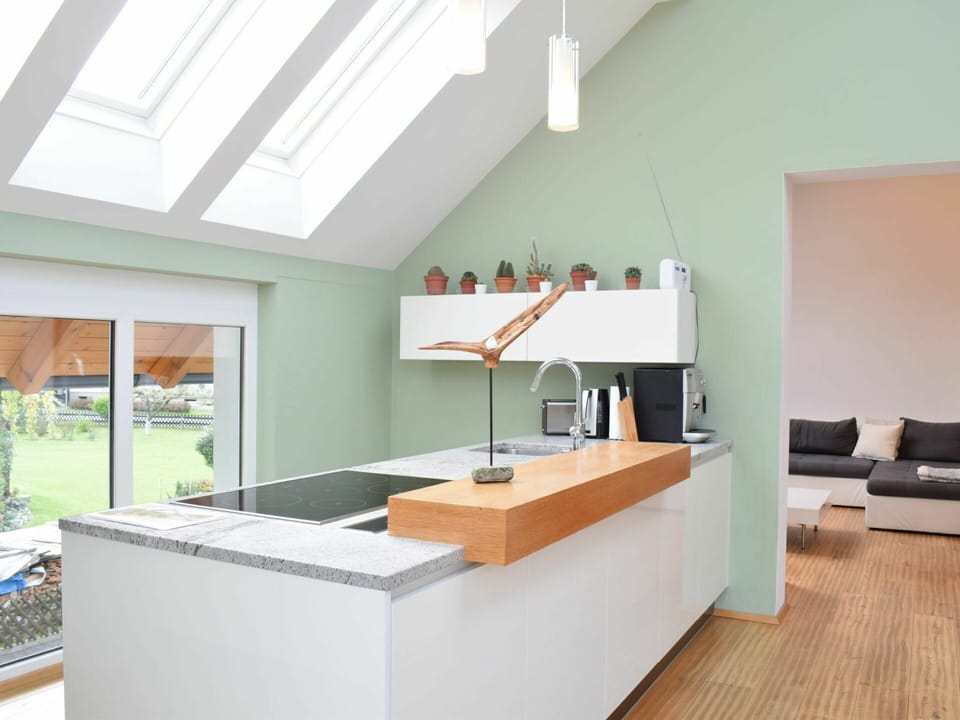 Building, Interior Design, Houseplant, Lighting, Wood, Floor, Flooring, Cabinetry, Real Estate
