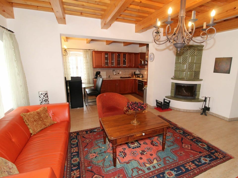 Furniture, Property, Picture Frame, Couch, Wood, Table, Interior Design, Lighting, Flooring, Chair