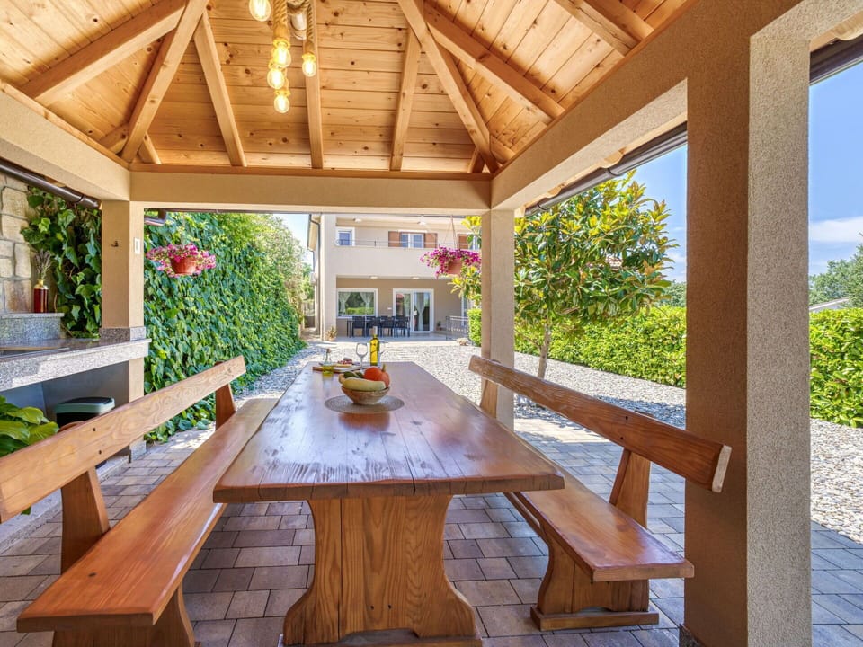 Wood, Ceiling, Furniture, Porch, Shade, Outdoor Furniture, Wood Stain, Garden, Chair, Outdoor Structure