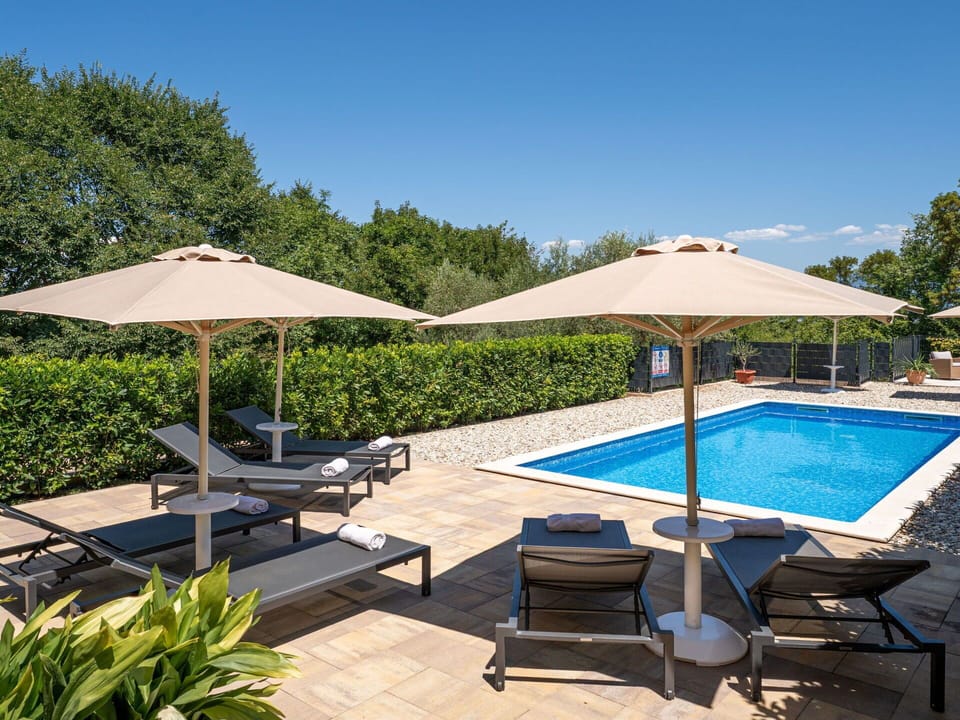 Umbrella, Swimming Pool, Outdoor Furniture, Furniture, Sunlounger, Chair, Resort, Shade, Outdoor Table, Composite Material