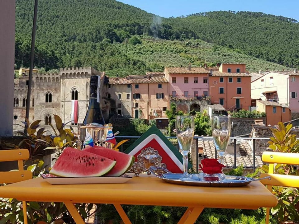 Plant, Building, Sky, Tree, Outdoor Furniture, Mountain, Window, Biome, Urban Design