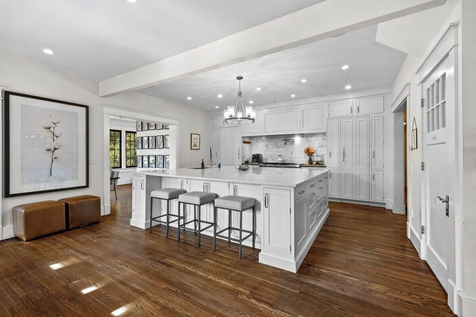 Our kitchen features a MASSIVE granite island with bar seating.