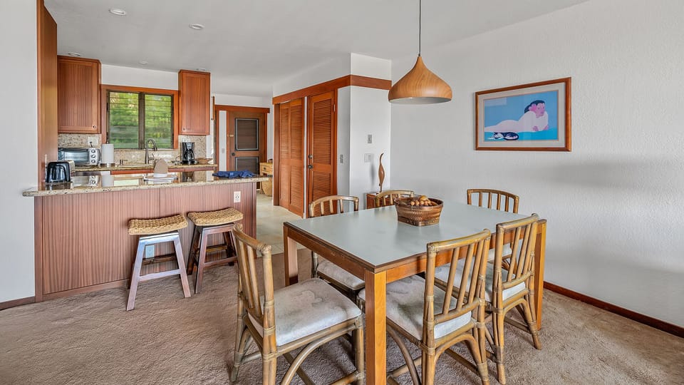 Nihi Kai Villas at Poipu #824 - Dining Room, Kitchen & Entry - Parrish Kauai