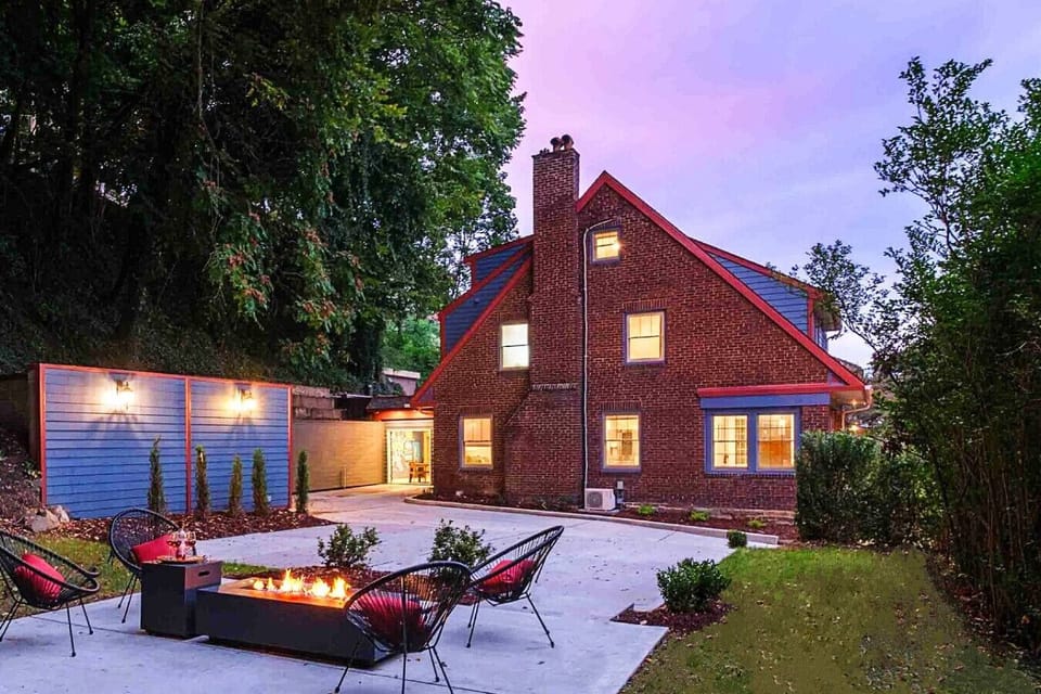 Evenings Made Easy – Tucked beneath the trees, this backyard fire pit is perfect for late-night chats and quiet stargazing. And look at all that off-street parking!
