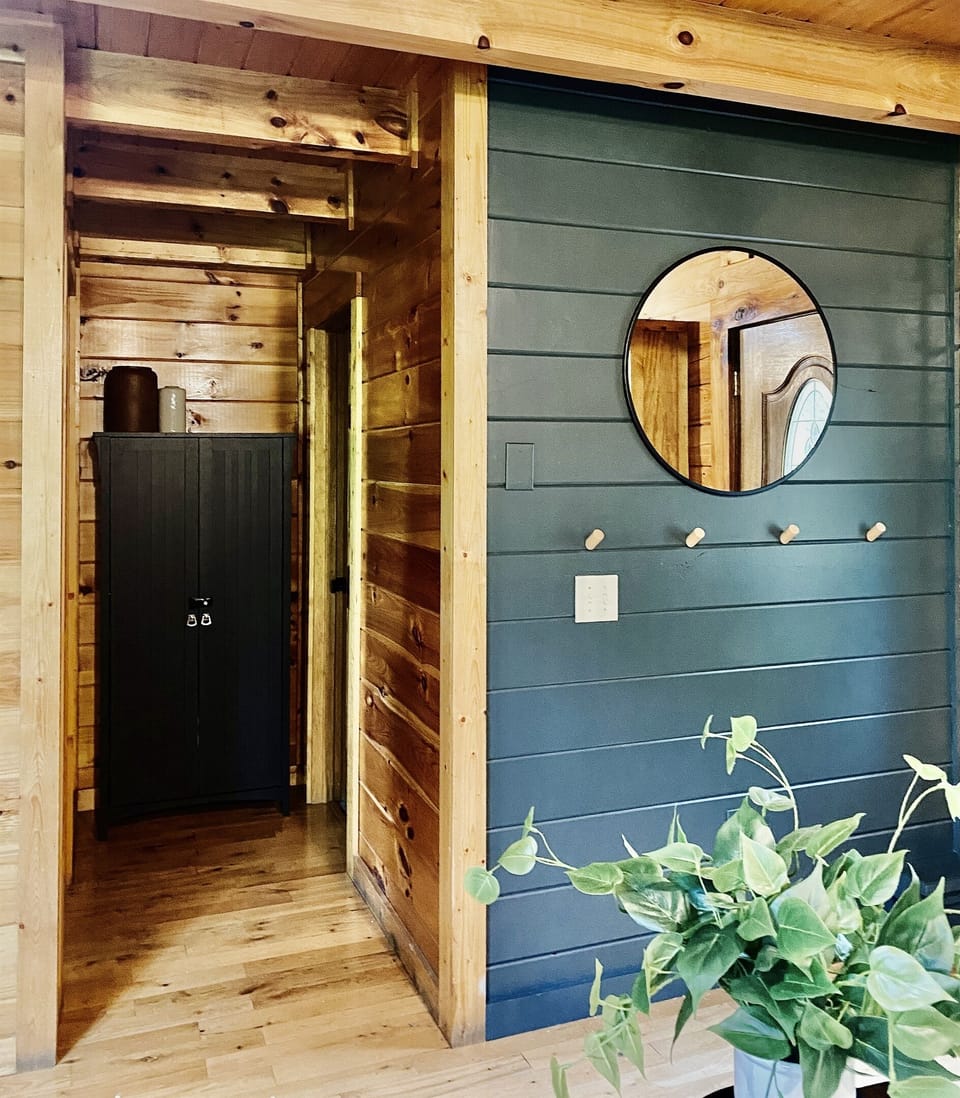 Hallway leading into Primary Bedroom and main floor bath