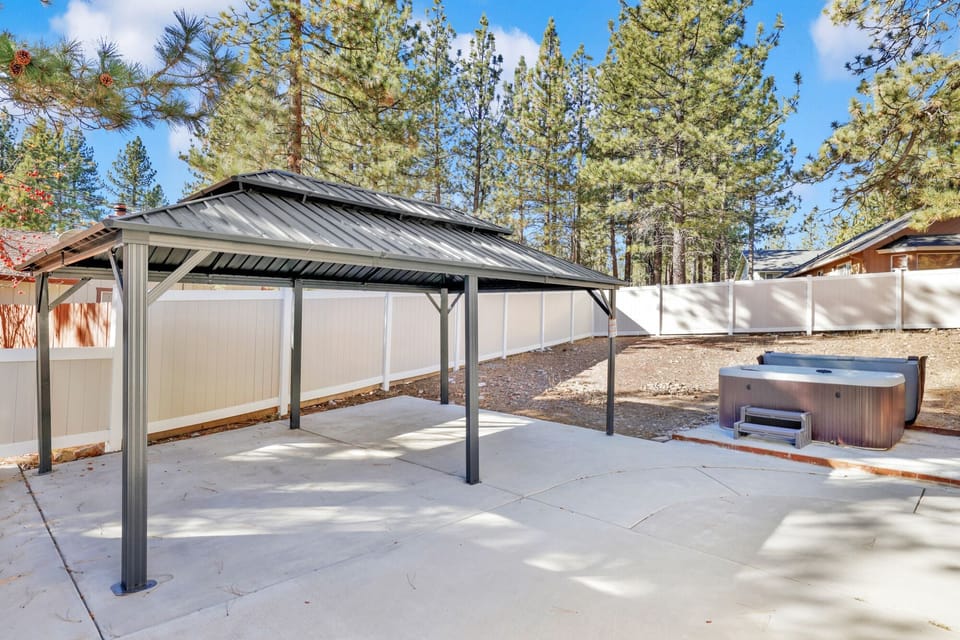 Bright hot tub setup with modern design and inviting ambiance, offering guests comfort and memorable stays.
