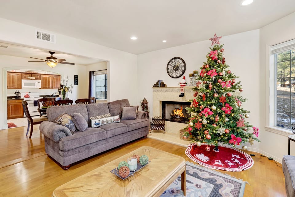 Bright living room with tasteful finishes and natural light, perfect for family fun, games, and warm conversations.