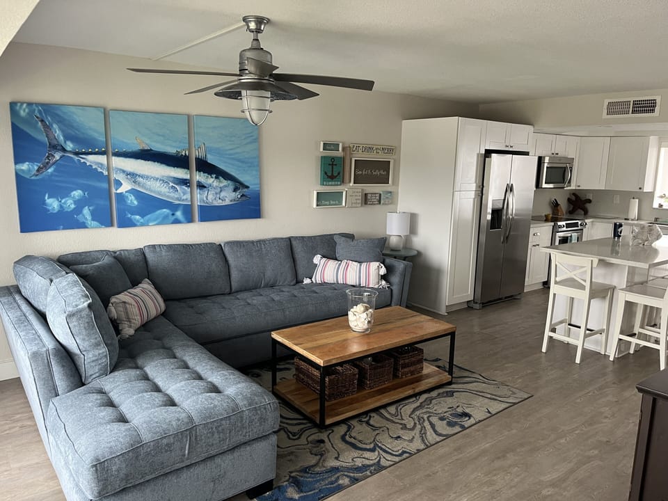 Second floor has living room, kitchen and a full bath