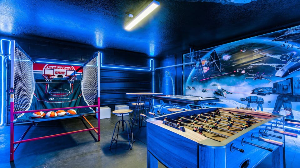 Epic neon game room w/ foosball, basketball, & galactic vibes!
