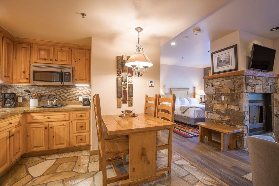 Cozy and comfortable layout with full kitchen, king bed and queen sleeper couch.