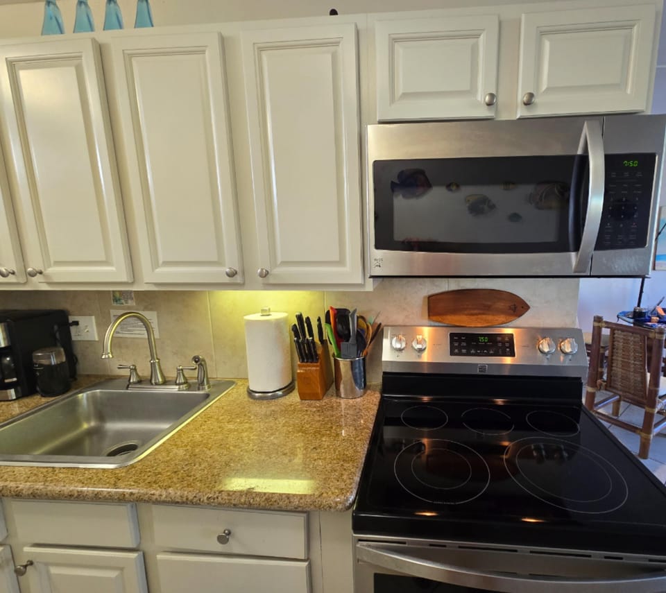 Modern cooktop and microwave.