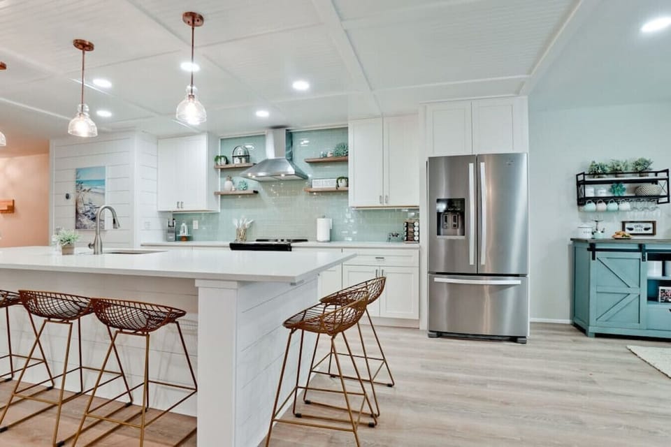 Prepare meals with ease and elegance in our generously designed kitchen, complete with a sprawling countertop that beckons for culinary adventures