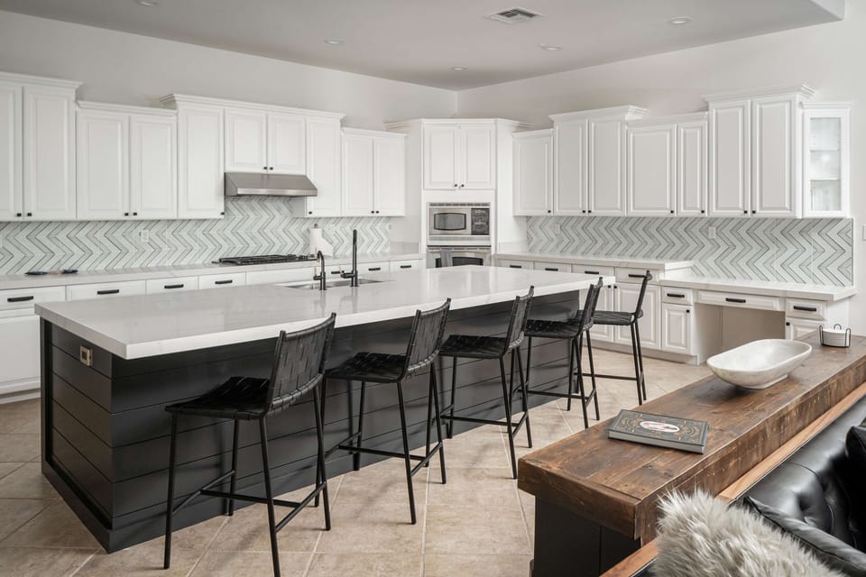 Sit up island in the kitchen makes a great space for kids to do homework or just to gather in the kitchen!