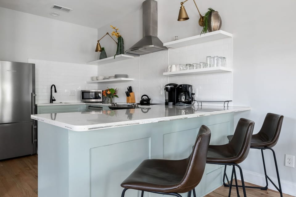 Fully equipped kitchen with bar seating