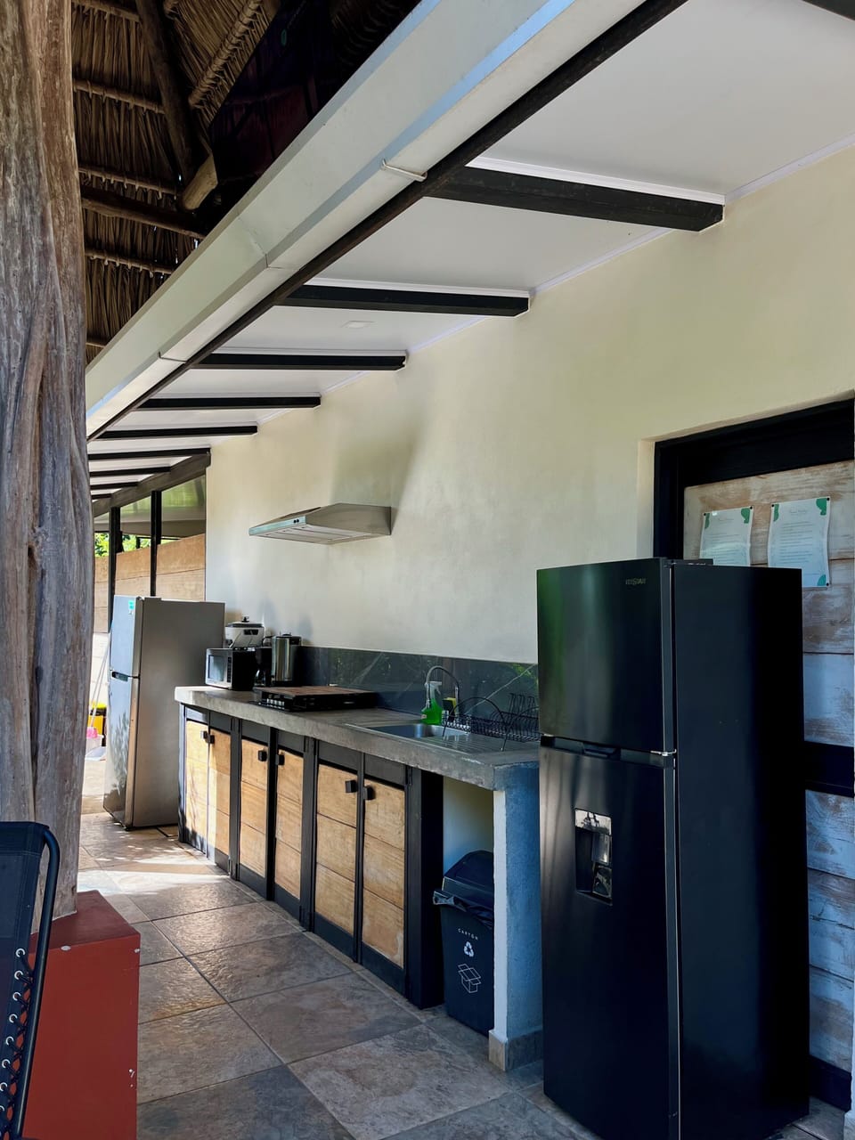 2 fridges, stove, microwave, coffee maker, kettle, full dishes