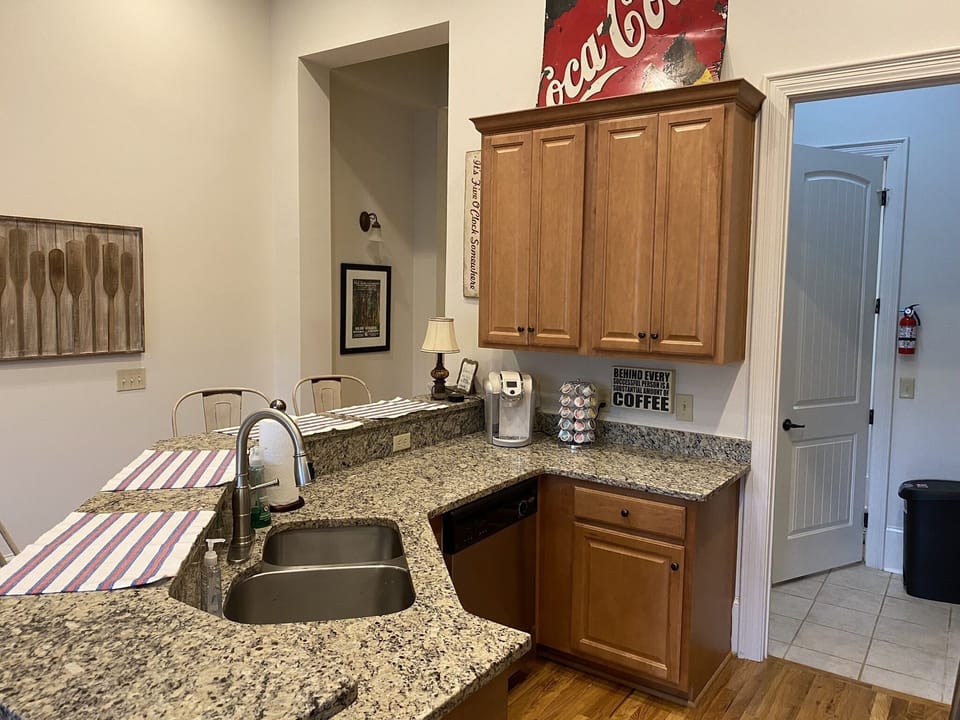 Kitchen -fully stocked and dishwasher, of course! Dishwasher liquid supplied.