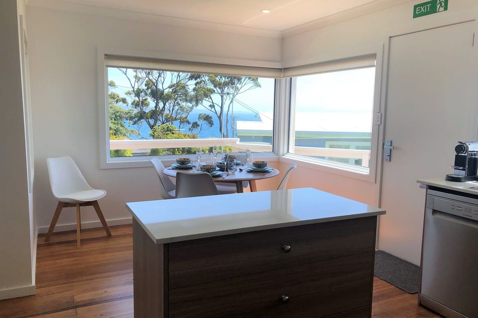Kitchen island, dining area, views