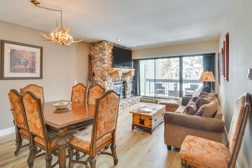 Entertaining is easy with the dining and living room overlooking the Eagle River