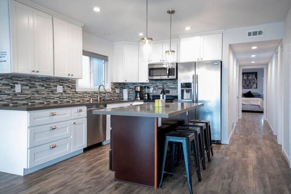 Floor #1 (Condo #1) large kitchen with stainless steal appliances (1).